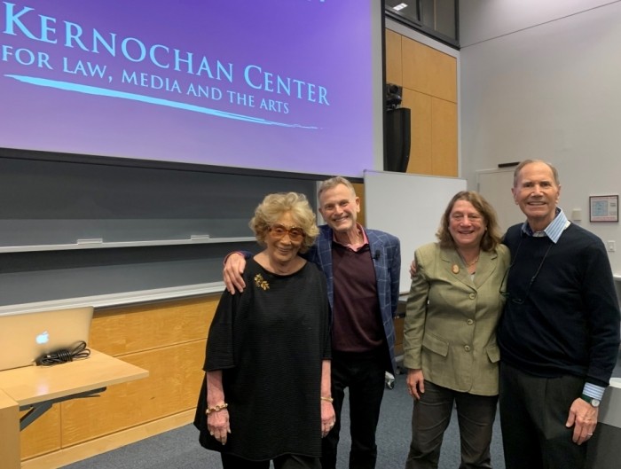 Myna Gershon (wife of Freddie), Jonathan Wolff, Prof. Jane Ginsburg, and Freddie Gershon are posing for a picture inside of classroom